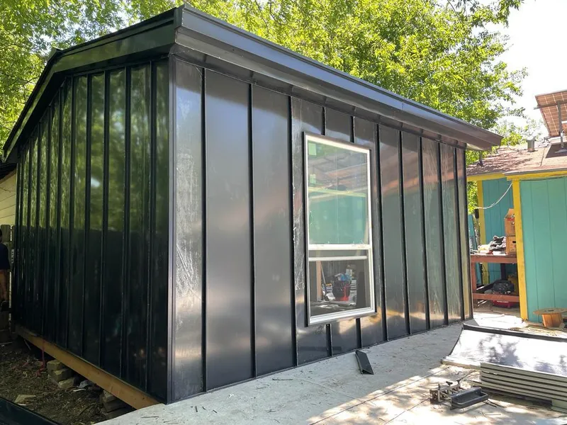 Black standing seam metal wall panels for Roof Inspection in Bellingham